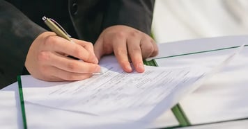 Grocer signing off on licenses needed to open a grocery store